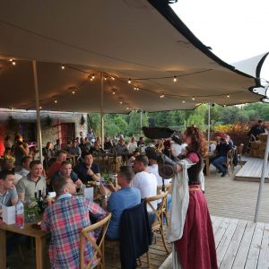 Group meal in the restaurant of the park Les Aigles du Léman with a bird show in a medieval atmosphere.